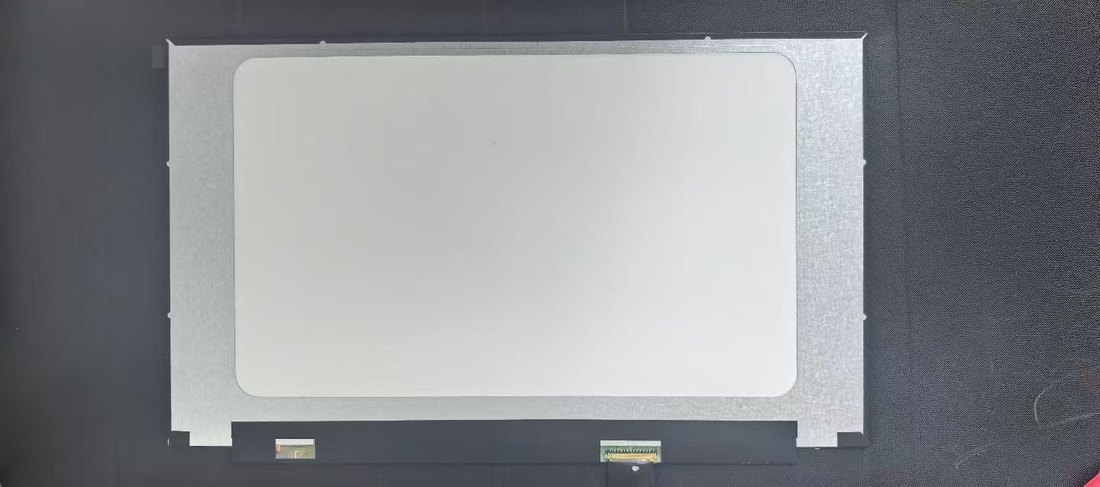 Bare OEM-grade laptop LCD panel showing the 30/40-pin eDP connector